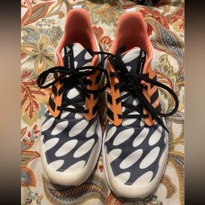 Adidas tennis shoes. Size 5 in perfect condition. Only worn once to work.